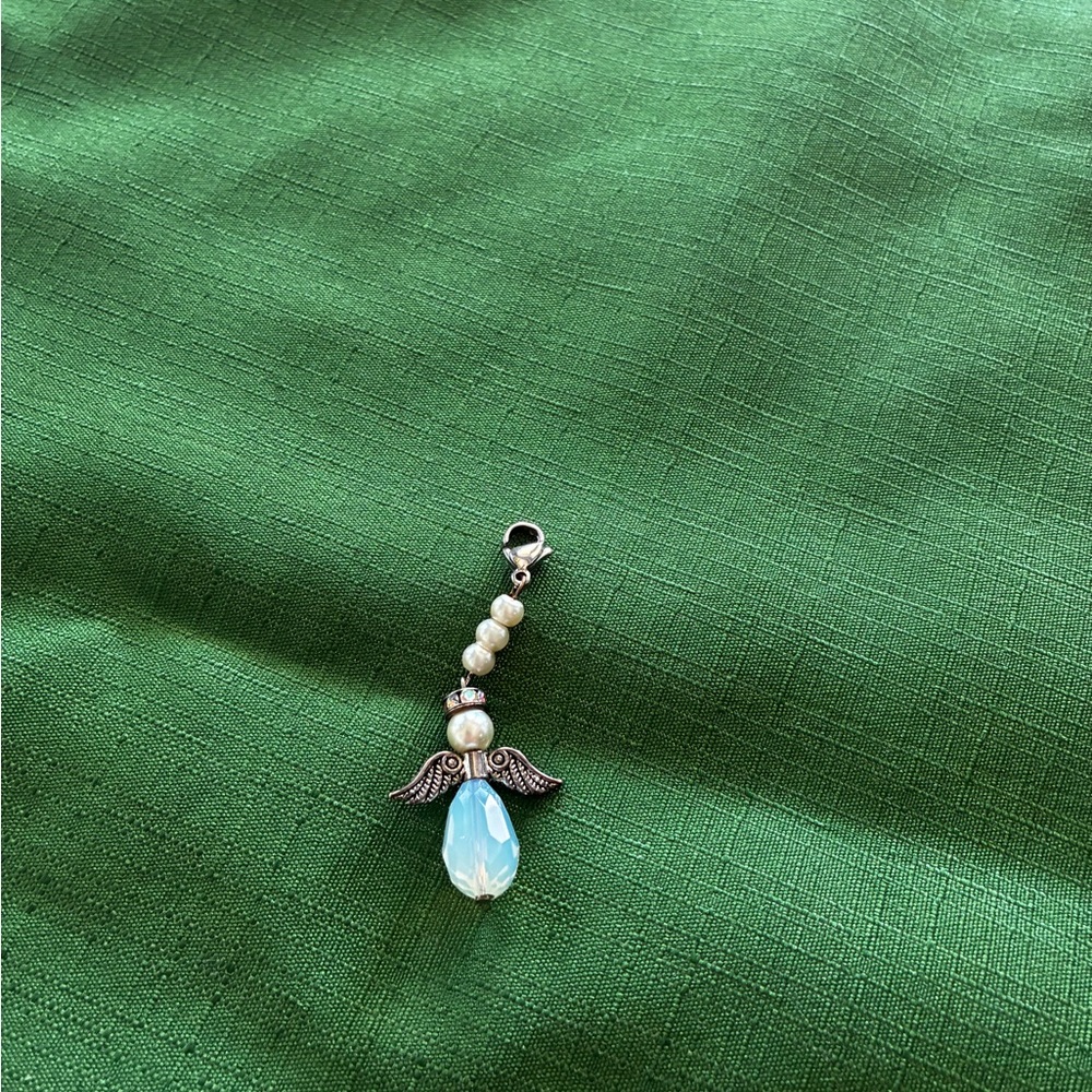 Angel purse zipper clasp